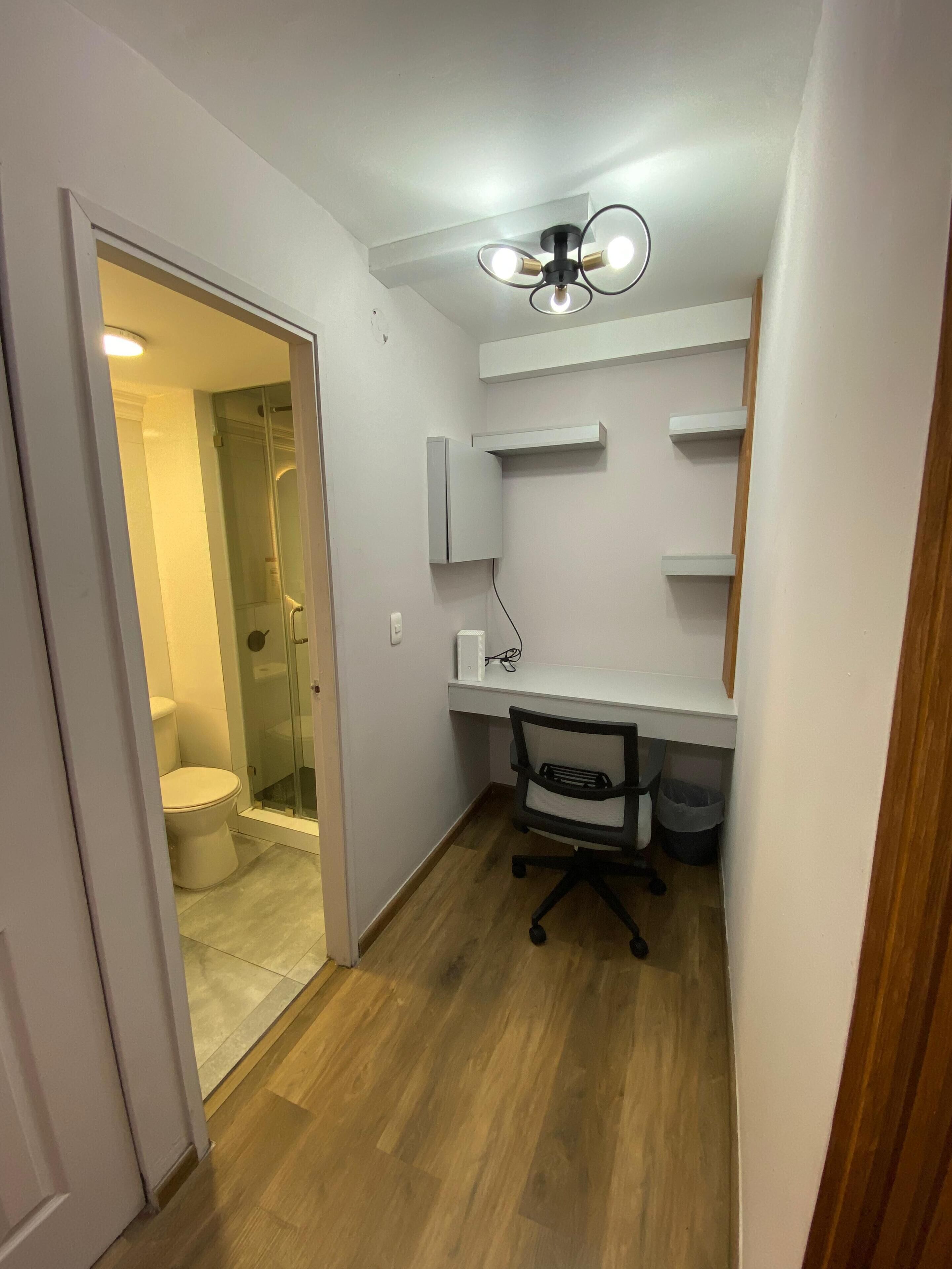 Shower, towels, toilet paper