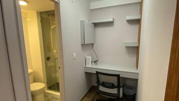 Shower, towels, toilet paper