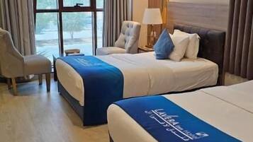 Twin Room, City View | In-room safe, soundproofing, iron/ironing board, free WiFi