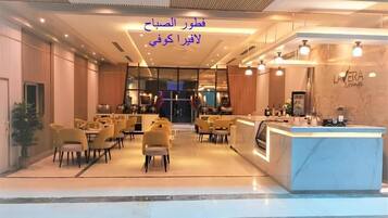 Twin Room, City View | Dining