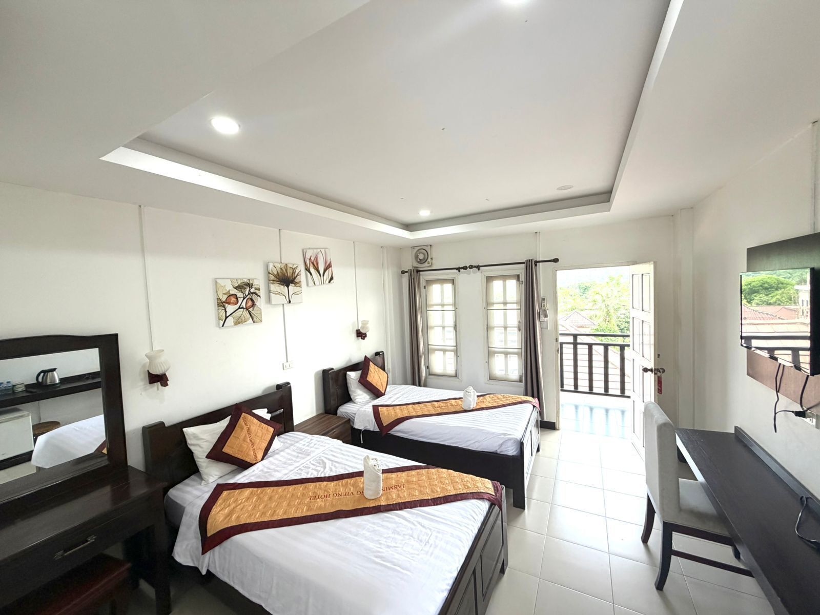 Deluxe Twin Room, City View | In-room safe, desk, laptop workspace, soundproofing