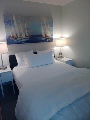 2 habitaciones, tabla de planchar con plancha y wifi 