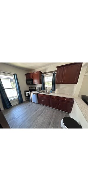 Fridge, microwave, oven, stovetop - Cozy KC Duplex 2BR Retreat Near Downtown (kansas city)
