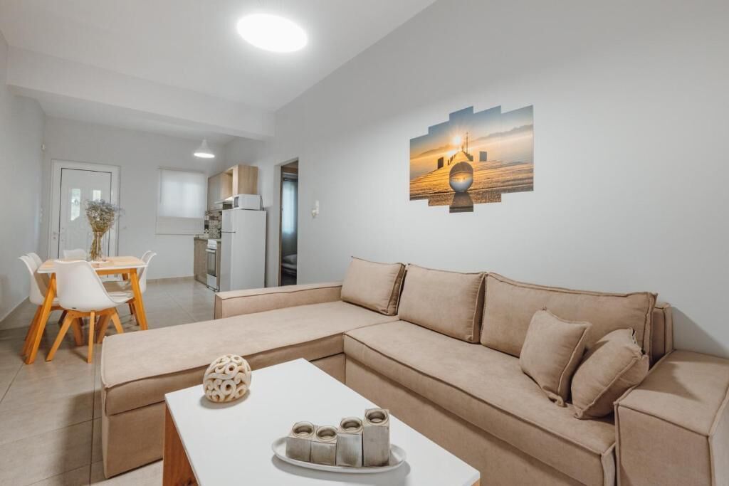 Apartment, Meerblick | Wohnbereich | 42-Zoll-Flachbildfernseher mit Digitalempfang