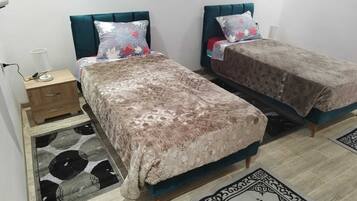 Coffres-forts dans les chambres, Wi-Fi gratuit, draps fournis