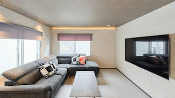 Comfort Villa | Living area | 65-inch flat-screen TV with cable channels, Netflix, streaming services