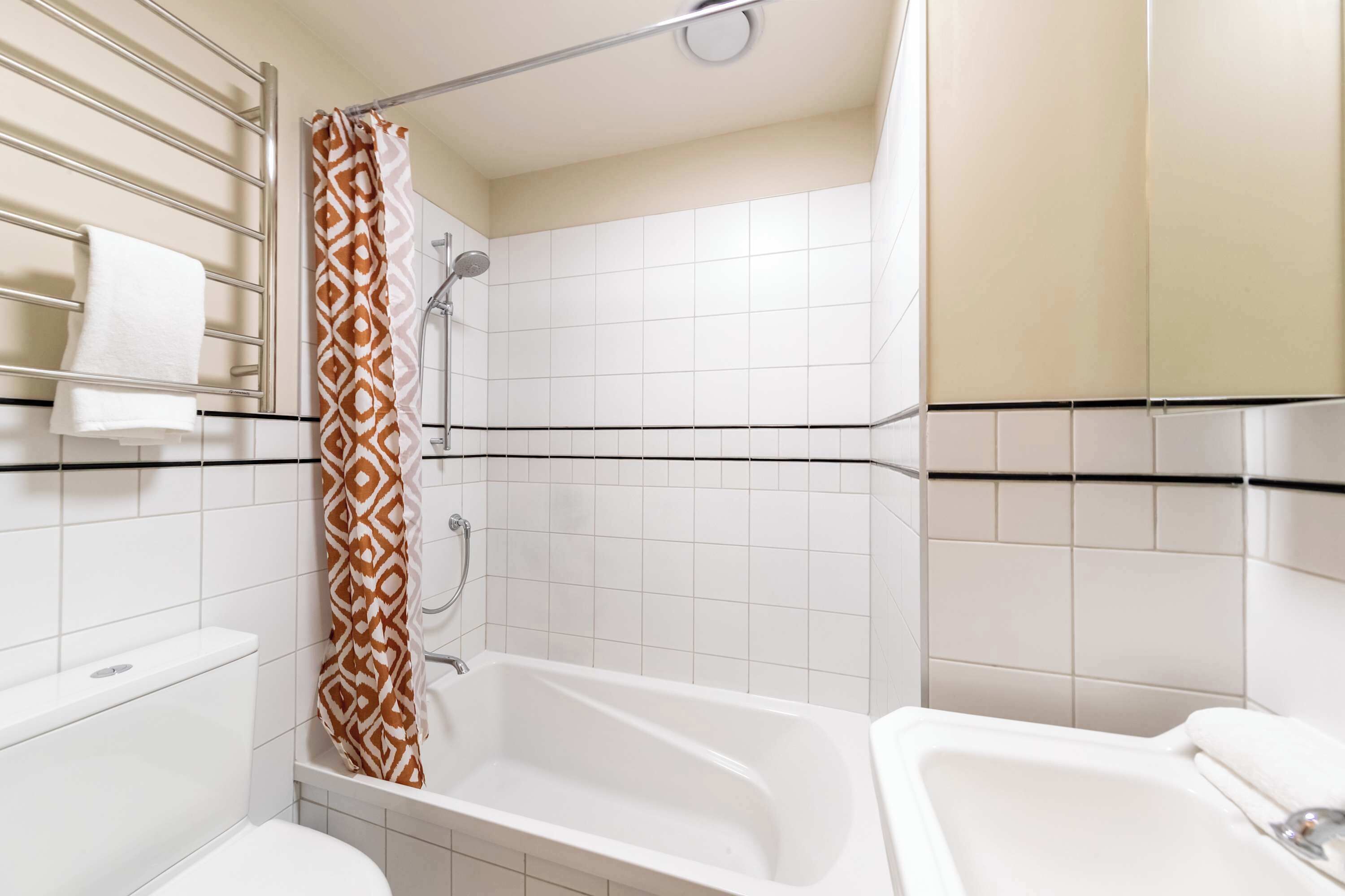 Shower, hair dryer, towels, shampoo