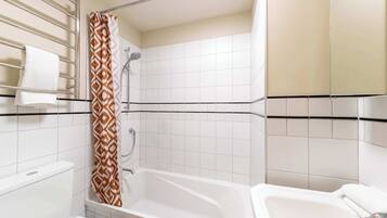 Shower, hair dryer, towels, shampoo