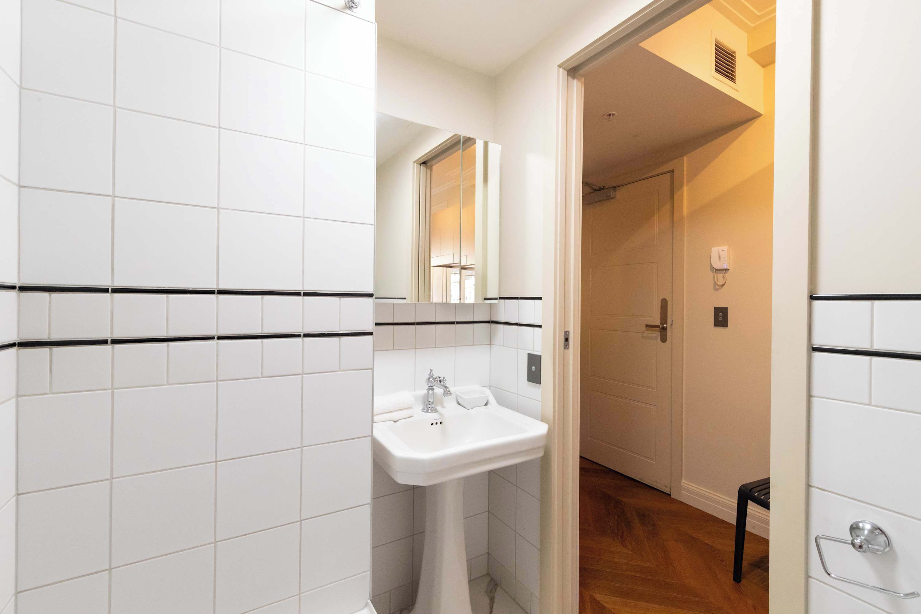 Shower, hair dryer, towels, shampoo