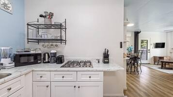 Fridge, microwave, stovetop, coffee/tea maker