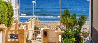 Andalusia, beachfront apartment, pool, terrace, parking.