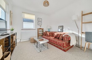 Living area - Points, an art deco Wittering family seaside holiday home for 10 guests (East Wittering)