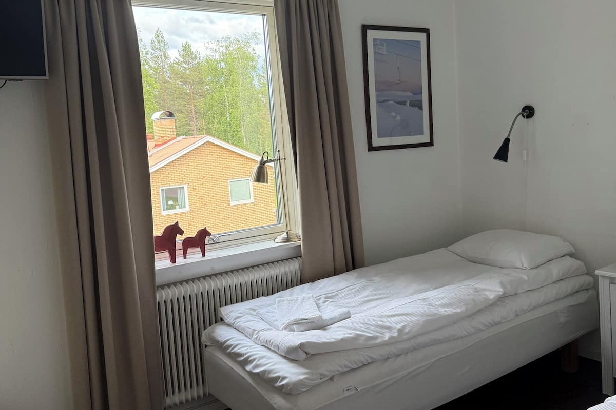Basic Quadruple Room, Courtyard View | Blackout drapes, WiFi (free)