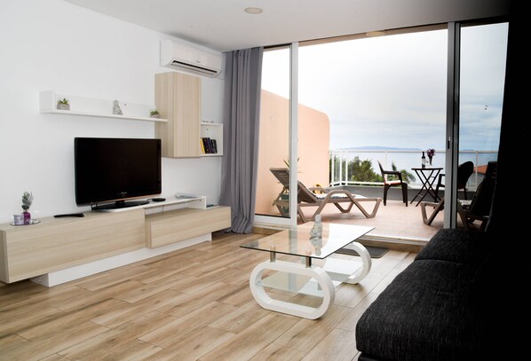 TV - Sunny Pearl Apartment (Caniço)
