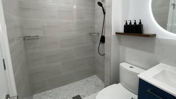 Hair dryer, towels, soap, toilet paper