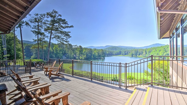 A wooden deck with outdoor seating, a view of a lake, and a forested landscape. - Private Hot Tub, Community Perks! Big Canoe Escape (Jasper)