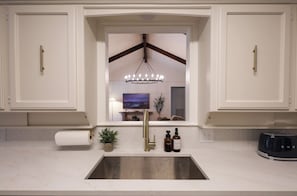 Interior - Luxury 4 Bedroom, 2.5 Bath retreat ideal location, just 9 minutes from AT&T Stadium! Movie Room, Hot Tub, Fire Pit, Coffee Bar, Outdoor Dining and seating, Ping Pong, Games, Bunk Room and Fireplace. (Grand Prairie)