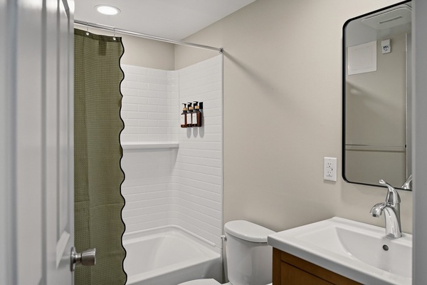 Combined shower/tub, hair dryer, towels, soap