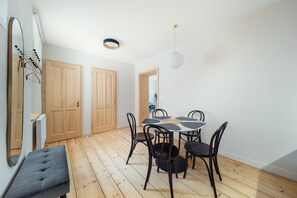Deluxe Apartment, City View | Dining room - Apartments Masaryk (Český Krumlov)
