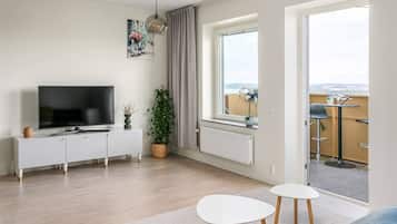 Apartment, 1 Schlafzimmer, barrierefrei, Balkon | Wohnzimmer