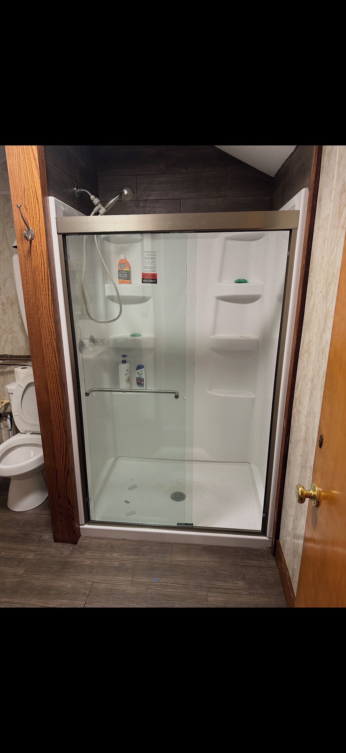 Shower, towels, soap, toilet paper