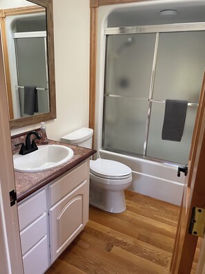 Jetted bath, hair dryer, towels, soap