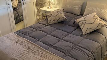 1 bedroom, desk, iron/ironing board, travel cot