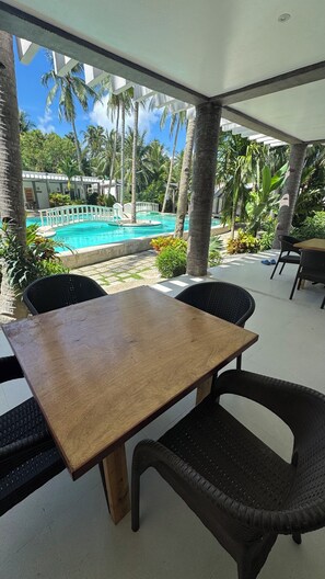 Family Bungalow, Balcony, Pool View | Outdoor dining - PILI BEACH RESORT AGMANIC (Santa Fe)
