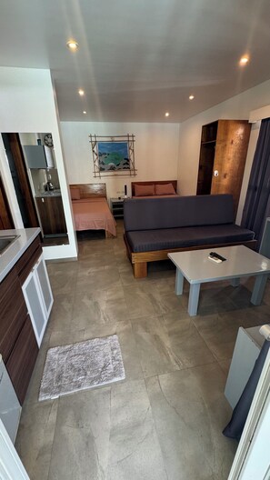 Deluxe Double or Twin Room, Balcony, Pool View | Living area - PILI BEACH RESORT AGMANIC (Santa Fe)