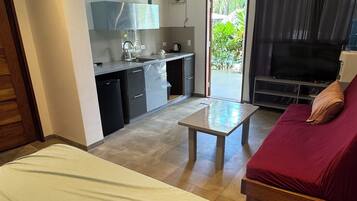 Deluxe Single Room, Balcony, Pool View | Desk, laptop workspace, free WiFi