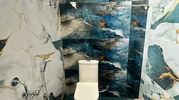 Quadruple Room, Beach View | Bathroom | Towels, soap