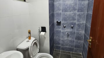 Standard Apartment, 2 Bedrooms, City View | Bathroom | Slippers, towels, soap, shampoo