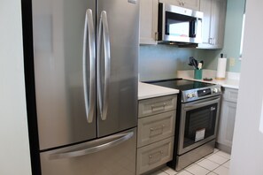 Private kitchen - NEW! Surfside Oasis - Oceanfront 1 bedroom Beach Condo in New Smyrna Beach FL (New Smyrna Beach)