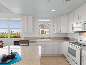 Coffee/tea maker, fridge, microwave, oven
