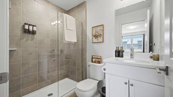 Hair dryer, towels, soap, toilet paper