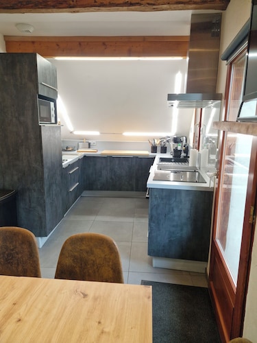 1st-floor apartment+2 private parking spaces.large, peaceful balcony.