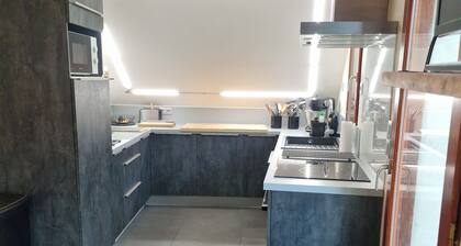 1st-floor apartment+2 private parking spaces.large, peaceful balcony.