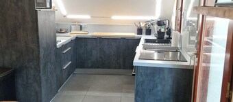 1st-floor apartment+2 private parking spaces.large, peaceful balcony.