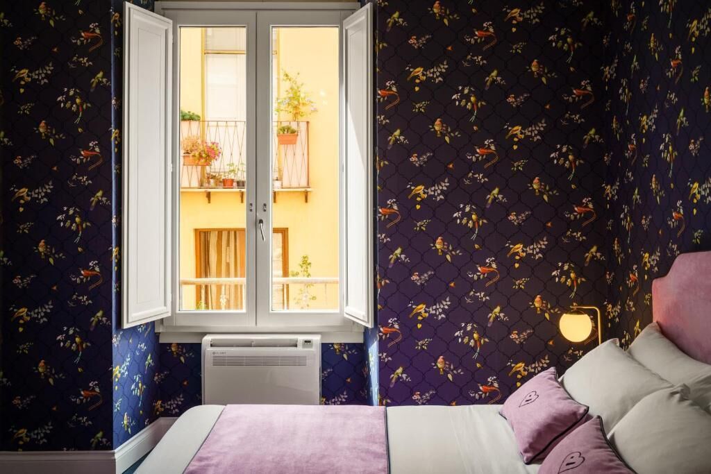 Deluxe tweepersoonskamer | Een kluis op de kamer, verduisterende gordijnen