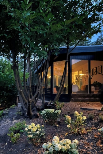 Authentic timber house with forest near Ebeltoft