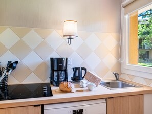 Apartment | Private kitchen - Chic Riverfront Stay With Balcony (Mandelieu-La-Napoule)