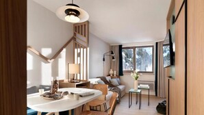 Ein modernes Interieur mit Essbereich, einer Couch, einem Fernseher und einer Treppe.