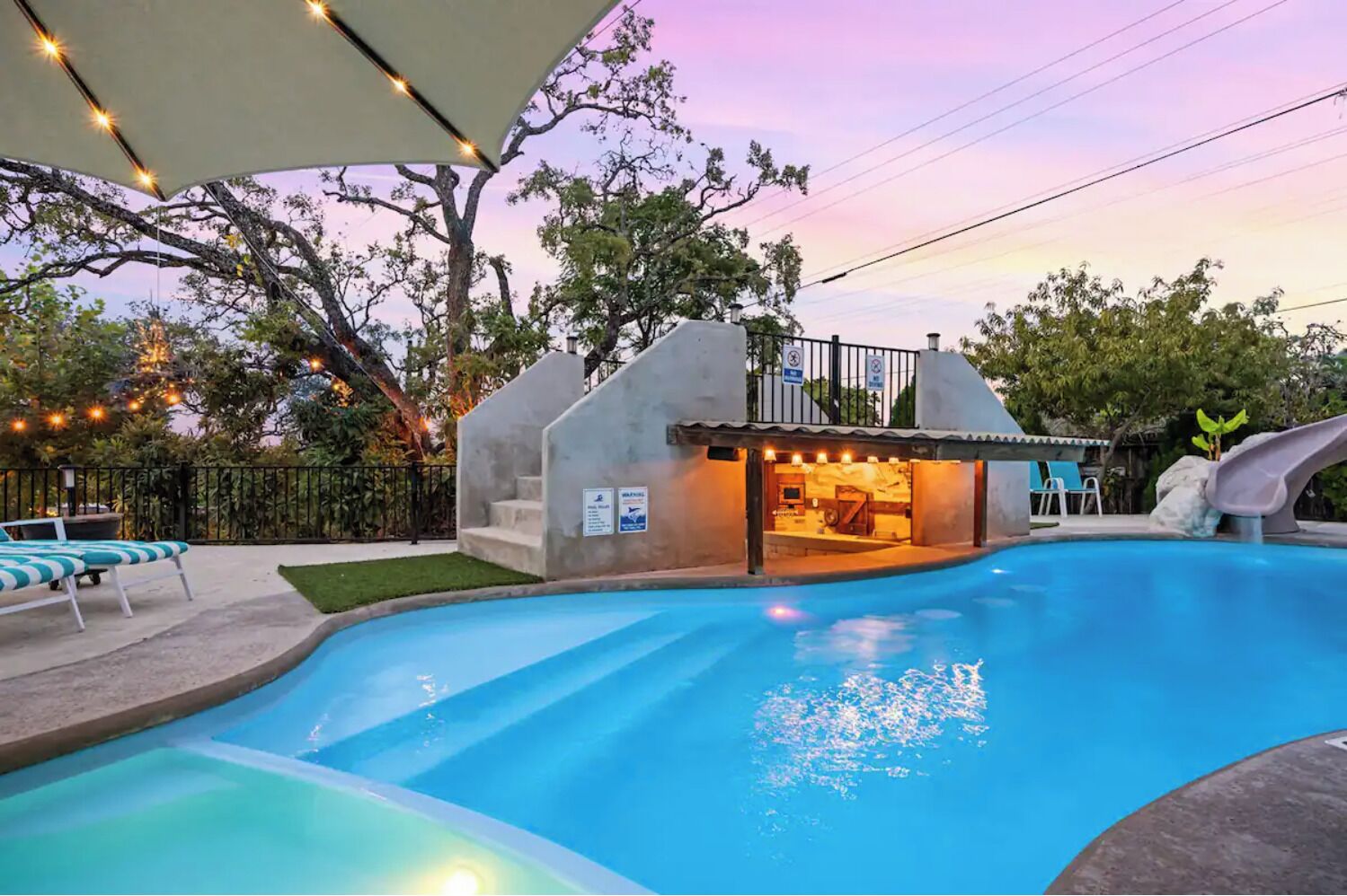 Kick Back and Relax in this Resort-like Heated, Saltwater Pool with Hot Tub