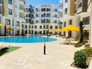 Outdoor pool - Brand-new cozy studio with pool, gym & restaurant (Hurghada)