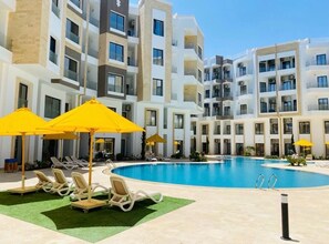 Outdoor pool - Brand-new cozy studio with pool, gym & restaurant (Hurghada)