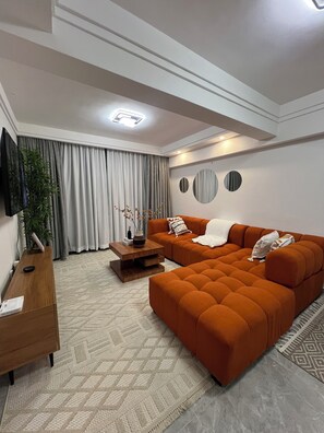 Living area - Charming 2-bedroom apartment in tranquil Nairobi neighborhood (Nairobi)
