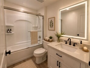 Hair dryer, towels, soap, shampoo