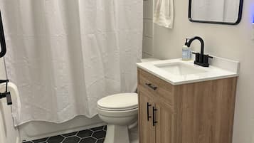 Jetted tub, hair dryer, towels, soap