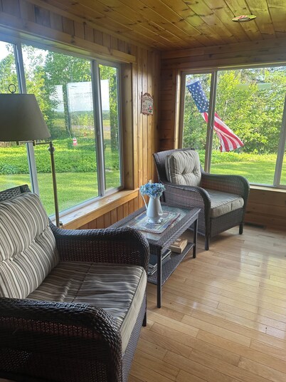 Charming 2-bedroom cottage and a separate “clubhouse”in peaceful Merrill