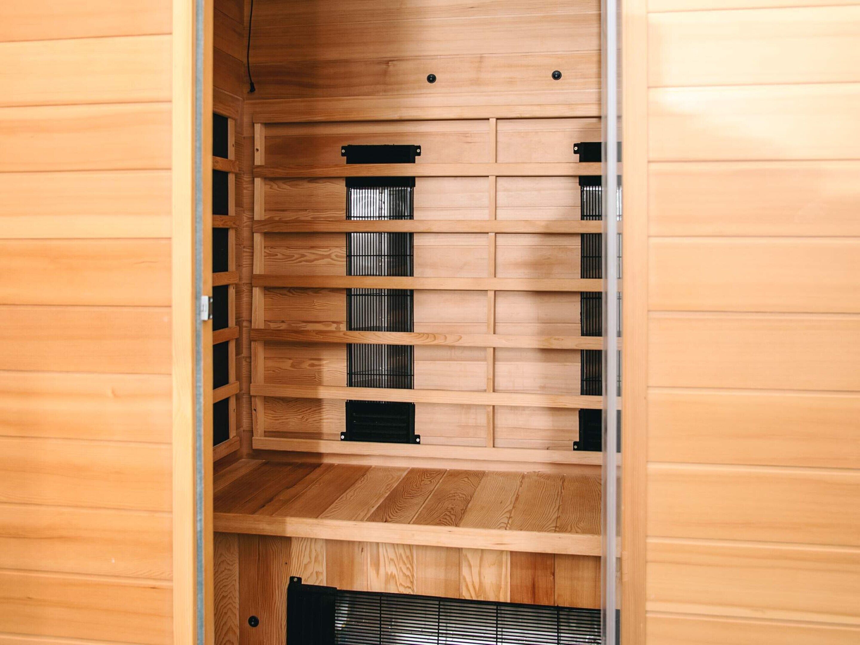 A wooden interior with a built-in shelving unit.